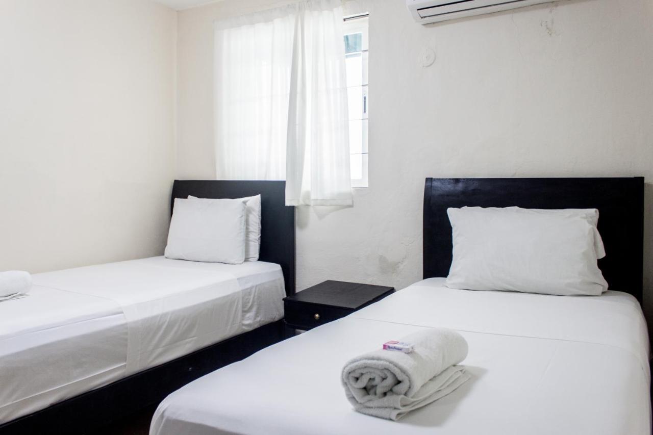 Whyz 4 You Private Rooms ปัวร์โตโมเรลอส ภายนอก รูปภาพ